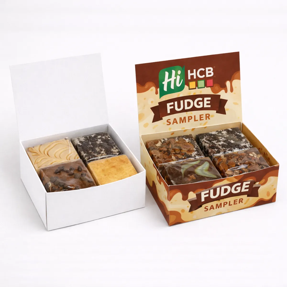 Multiple colourful fudge display boxes arranged to showcase sweet treats for a retail shop counter- class=